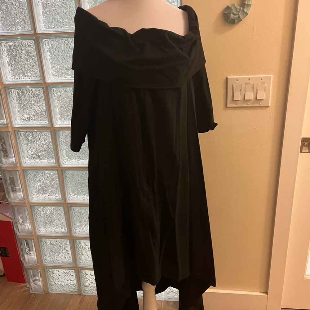 Long asymmetrical black off shoulder top